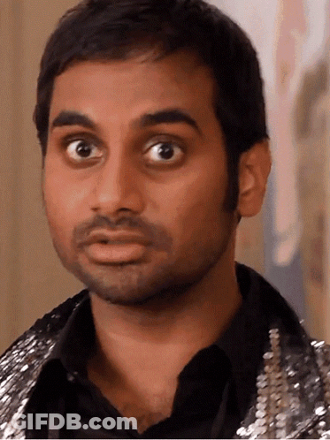 Man's Face In Black Shirt And Silver Jacket GIF