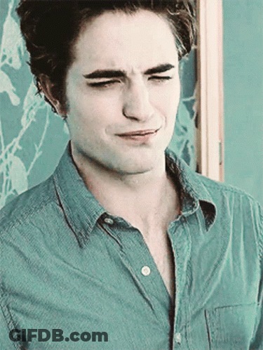 Man's Face In Blue Shirt Close Up GIF
