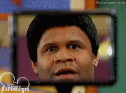 Man's Face In Disney Rear View Mirror GIF