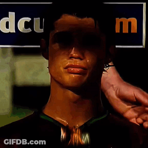 Man's Face In Front Of DCU Sign GIF
