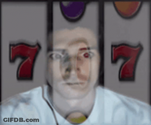 Man's Face In Front Of Slot Machine Seven GIF