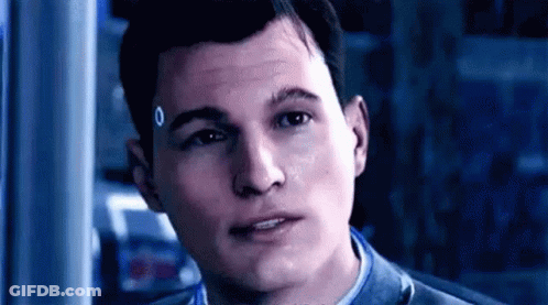 Man's Face In Video Game Dark Room GIF