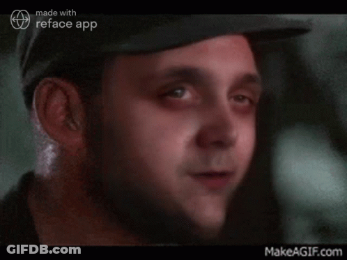 Man's Face Next To Smiley Face GIF