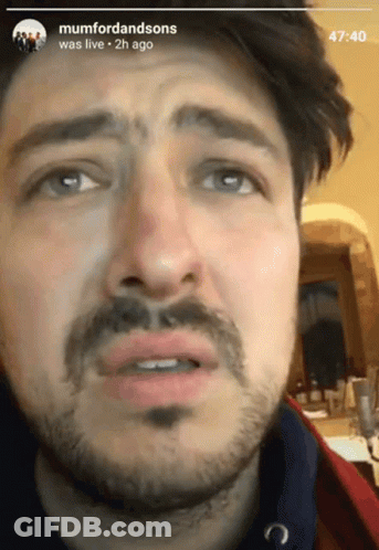 Man's Face Showing 4:40 GIF