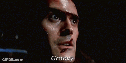 Man's Face With Blood And Groovy Text GIF