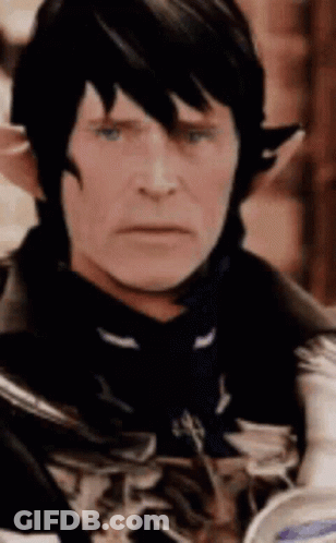 Man's Face With Ears And Blue Scarf GIF