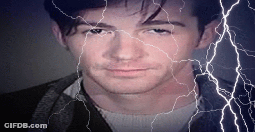 Man's Face With Lightning Behind GIF