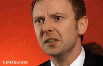Man's Face With Red Background GIF