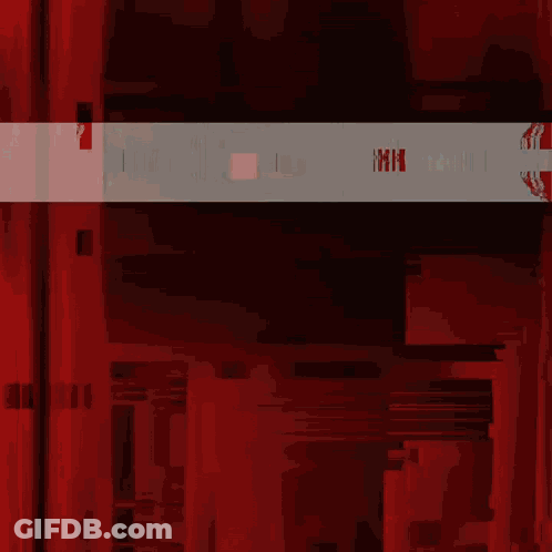 Man's Face With Red Curtain GIF