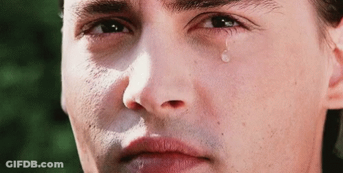 Man's Face With Tear GIF