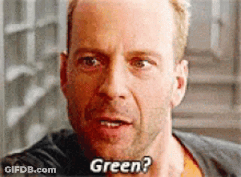 Man's Face With The Word Green GIF