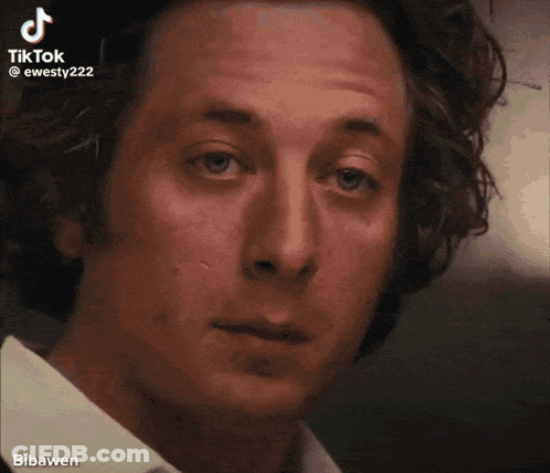 Man's Face With TikTok Watermark GIF