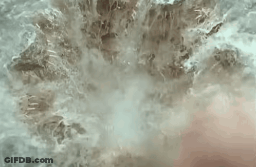 Man's Face With Water Spraying GIF