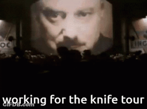 Man's Face Working For The Knife Tour GIF