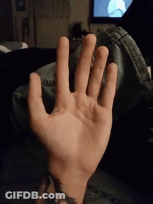 Man's Hand Clenched Movements GIF