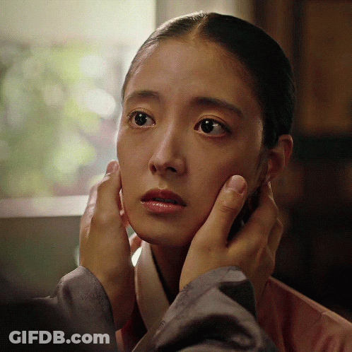 Man's Hands On Woman's Face GIF