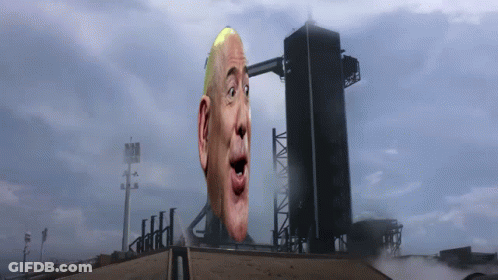 Man's Head In Front Of Black Building GIF