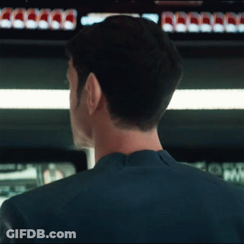 Man's Head In Front Of Coca Cola Cans GIF