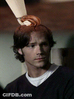 Man's Head With Chocolate Frosting Swirl GIF