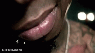 Man's Mouth With Ear Buds GIF