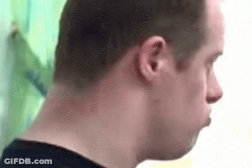 Man's Neck And Ear Against Green Background GIF