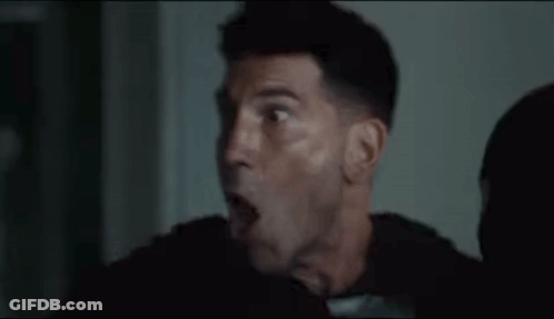 Man's Open Mouth In Dark Room GIF