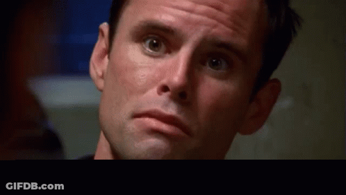Man's Serious Face Close Up GIF