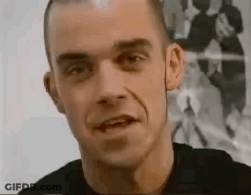 Man's Smiling Face GIF