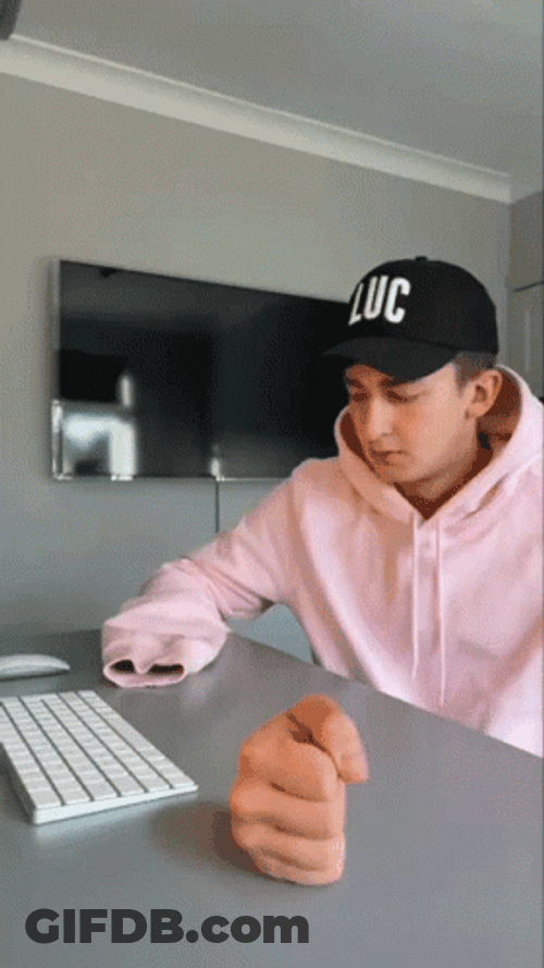 Man's Thumb Trick GIF
