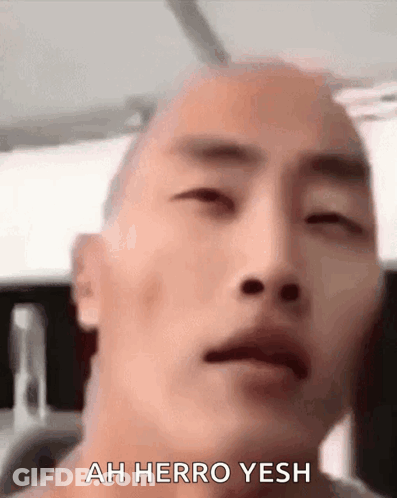 Man Saying Ah Herro Yesh GIF