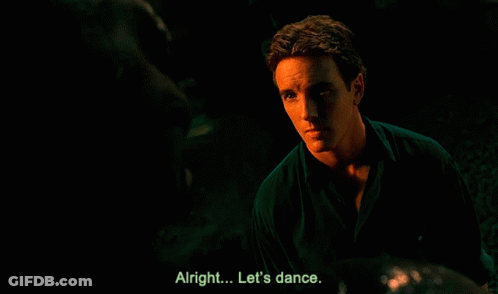 Man Saying Alright Let's Dance In Dark Scene GIF