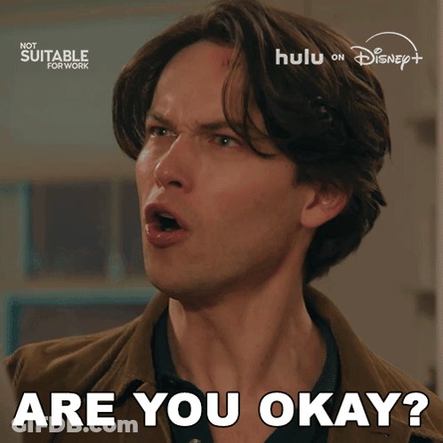 Man Saying Are You Okay In Front Of Hulu On Disney Sign GIF
