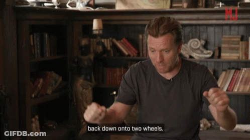 Man Saying Back Down Onto Two Wheels GIF