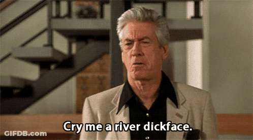 Man Saying Cry Me A River Dickface In Front Of Staircase GIF