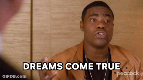 Man Saying Dreams Come True In Peacock Jacket GIF