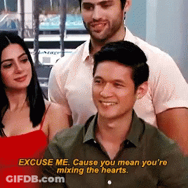 Man Saying Excuse Me Mixing Hearts GIF