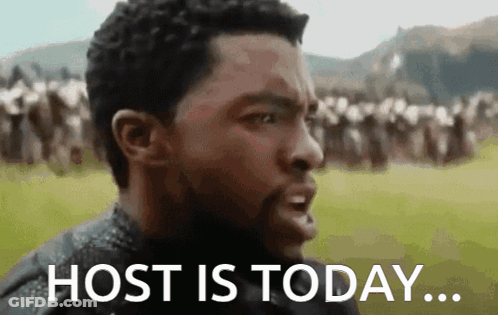 Man Saying Host Is Today In Front Of Group GIF