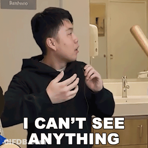 Man Saying I Can't See Anything In Front Of Bathroom GIF