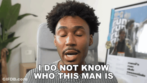 Man Saying I Do Not Know Who This Man Is At Computer GIF