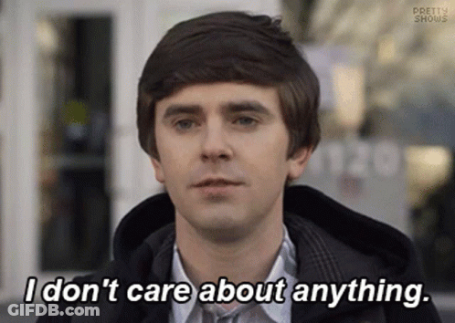 Man Saying I Don't Care About Anything In Front Of Building GIF