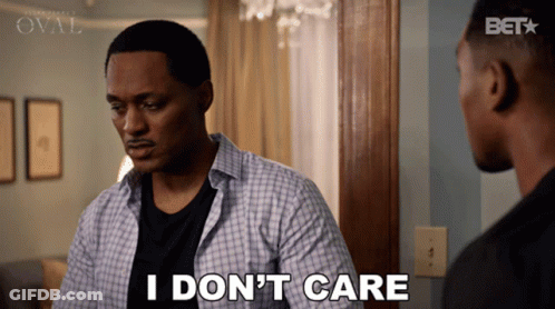 Man Saying I Don't Care To Another Man GIF