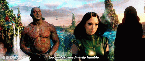 Man Saying I Too Am Extraordinarily Humble Beside Woman GIF