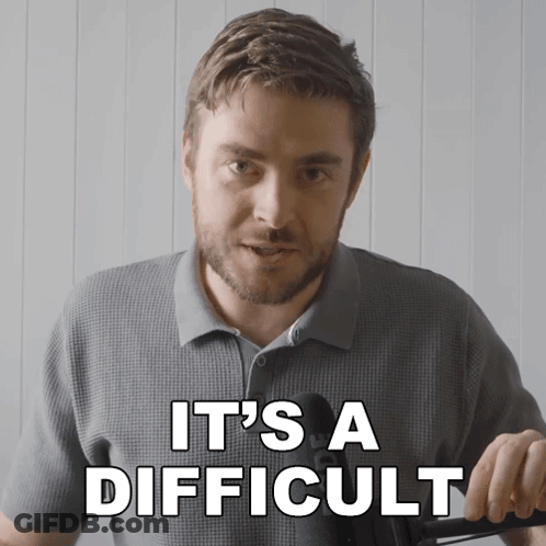 Man Saying It's A Difficult While Holding Something GIF