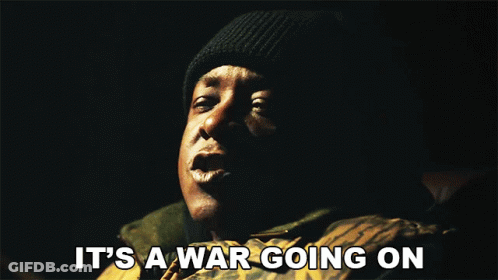 Man Saying It's A War Going On Dark Room GIF
