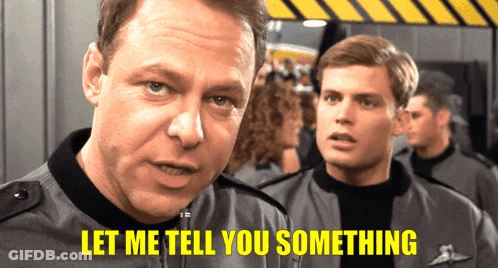 Man Saying Let Me Tell You Something To Another Man GIF