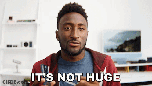 Man Saying Not Huge In Front Of Monitor GIF