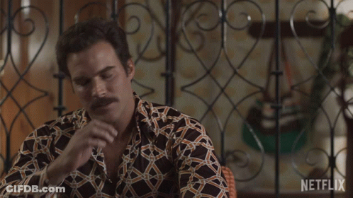 Man Saying Por Esta In Front Of Wrought Iron Gate GIF