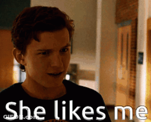 Man Saying She Likes Me In Front Of Door GIF
