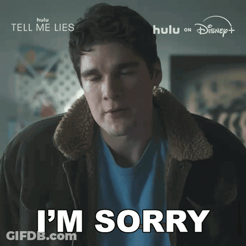 Man Saying Sorry In Jacket And Blue Shirt GIF