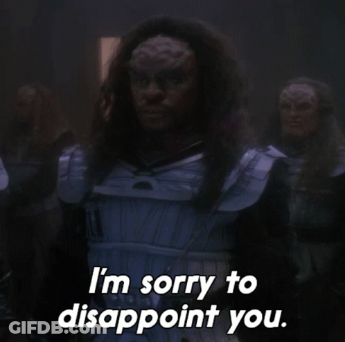 Man Saying Sorry To Disappoint In Dark Room GIF